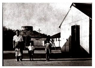 Family by water tank