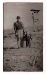 Father and daughter portrait with guard tower - A powerful symbol of family life under surveillance